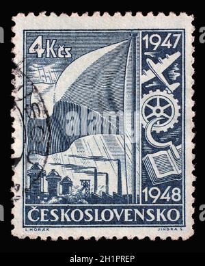 Le timbre imprimé en Tchécoslovaquie montre le symbolisme de l'économie nationale, série de plans économiques de deux ans, vers 1947 Banque D'Images