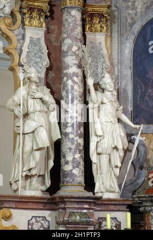 Saints Joseph et Catherine d'Alexandrie statue sur l'autel principal de l'église franciscaine de Saint François Xavier à Zagreb, Croatie Banque D'Images