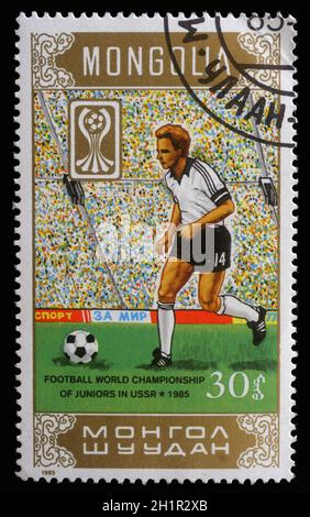 Timbres en Mongolie montrant Championnat du Monde de football des juniors en URSS vers 1985 Banque D'Images