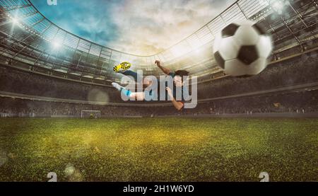 Scène de football avec un joueur qui lance le ballon à la volée au stade Banque D'Images