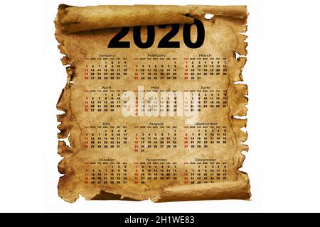 Année civile 2020 sur vieux papier sur fond blanc.La semaine commence le dimanche. Banque D'Images
