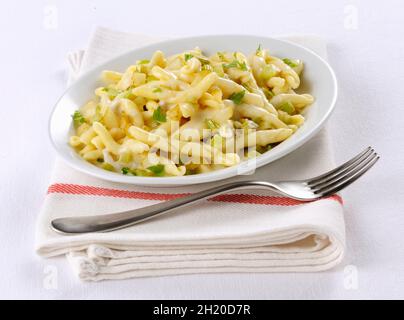 Strozzapreti avec gorgonzola et poire Banque D'Images