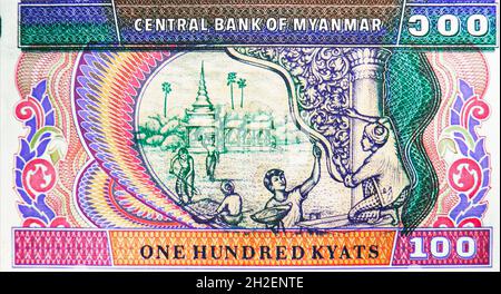 100 billet de banque Kyats, Banque du Myanmar, fragment de projet de loi de clôture montre les travailleurs restaurent le temple, publié en 1996 Banque D'Images