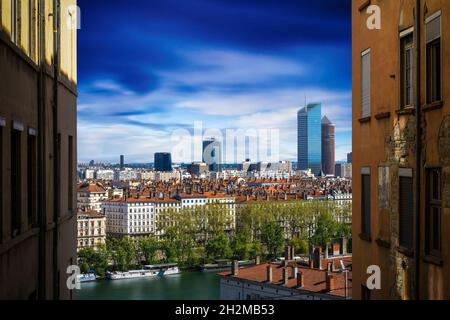 Buildings and downtown of Lyon in long exposure seen from Croix Rousse hill Stock Photo