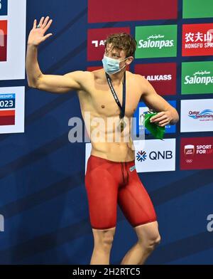 Doha, Qatar.23 octobre 2021.Pieter Coetze, d'Afrique du Sud, célèbre après la finale masculine de 100 m de course arrière à la coupe du monde de natation FINA 2021 à Doha, capitale du Qatar, le 23 octobre 2021.Credit: Nikku/Xinhua/Alay Live News Banque D'Images