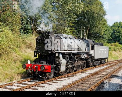 Worth Valley Railway 'Big Jim' un local à vapeur de classe américaine S160 utilisé par le corps américain de transport en Europe près de la fin de la Seconde Guerre mondiale vu à Oxenhope. Banque D'Images