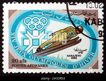 AFGHANISTAN - VERS 1984 : un timbre imprimé en Afghanistan montre le saut à ski, Jeux olympiques d'hiver de 1984, vers 1984 Banque D'Images