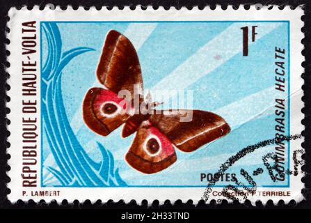 BURKINA FASO - VERS 1971 : un timbre imprimé au Burkina Faso montre Gonimbrasia Hecate, Moth, vers 1971 Banque D'Images