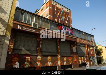 Europe, Italie, Lombardie, Milan, quartier Ortica.Art de rue avec des peintures murales de l'or.Me.Projet Ortica Memoria.Le travail consacré à la coopération. Banque D'Images