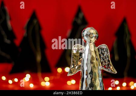 ange argenté avec arbres de noël Banque D'Images