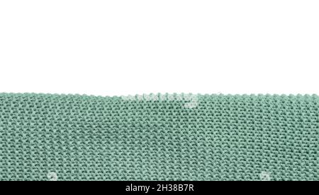 Tissu écossais tricoté sur fond blanc, gros plan Banque D'Images
