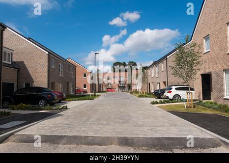Nouvelles maisons à Joseph Lancaster Lane, le nouveau développement dans le nord de Chichester, West Sussex, Angleterre, Royaume-Uni. Banque D'Images