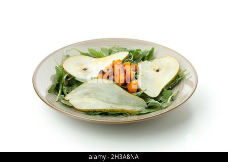 Assiette avec salade de citrouille isolée sur fond blanc Banque D'Images