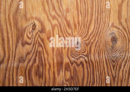 Détail de surface d'un panneau en bois noueux Banque D'Images