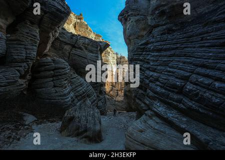 Une randonnée à travers Lick Wash, un lointain canyon affluent de Upper Buckskin Gulch dans l'Utah près de Kanab. Banque D'Images