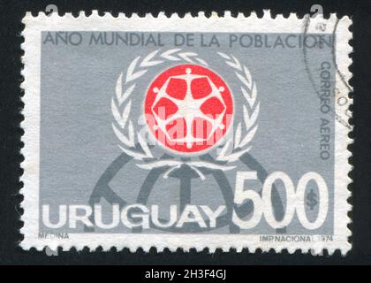 URUGUAY - VERS 1974: Timbre imprimé par l'Uruguay, montre WPY Emblem, vers 1974 Banque D'Images