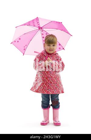 Petite fille avec parapluie Banque D'Images