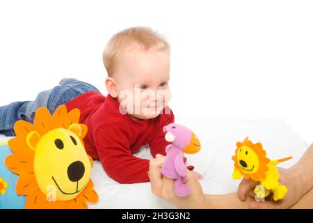 Baby boy playing with toys Banque D'Images