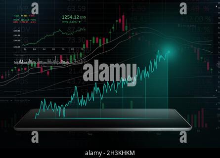 Graphique financier vert projeté à partir d'une tablette numérique Banque D'Images