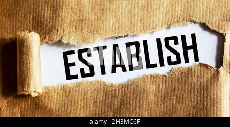 établissez le concept de mot sur du papier brun déchiré.Concept des affaires et des sciences Banque D'Images