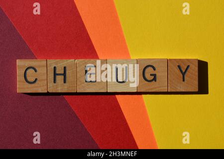 Cheugy, mot en lettres de l'alphabet en bois, popularisé par la génération Z, pour décrire les tendances de style de vie associées à la génération du millénaire, en face de la tendance Banque D'Images