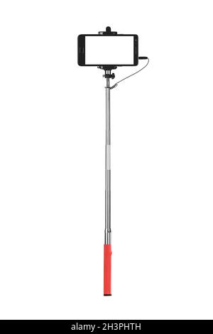 Smartphone avec stick selfies Banque D'Images