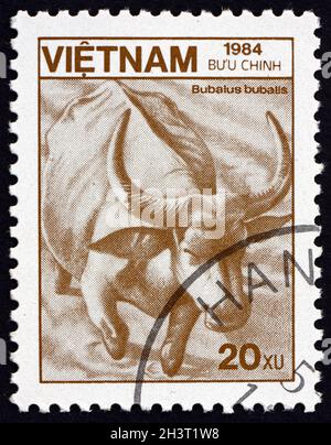 VIETNAM - VERS 1984: Un timbre imprimé au Vietnam montre le buffle d'eau (bubalus bubalis), est un grand bovid originaire du sous-continent indien, au sud Banque D'Images