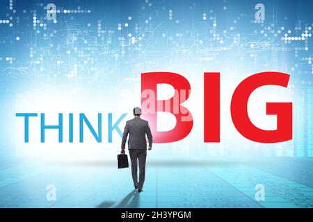 Pensez au grand concept avec l'homme d'affaires Banque D'Images