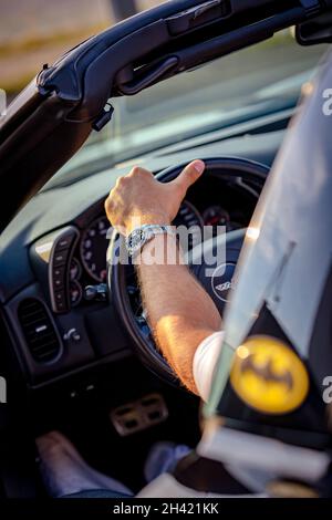 Corvette de Chevrolet : noir Batman avec conducteur Banque D'Images