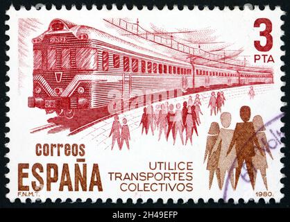 ESPAGNE - VERS 1980: Un timbre imprimé en Espagne montre train et gens, transport en commun, vers 1980 Banque D'Images