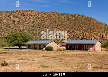 Sur maisons d'Omandumba guest Farm (Ferme) dans les montagnes d'Erongo près de Omaruru, Erongo, Namibie Région Banque D'Images