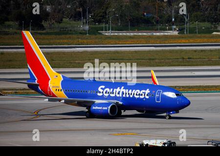 28 mars 2019, Los Angeles, Californie, États-Unis: A Southwest Airlines Co. Boeing Co. 737-700 (Inscription N919WN) taxis sur le tarmac à l'aéroport international de Los Angeles (LAX) le jeudi 28 mars 2019 à Los Angeles, en Californie © 2019 Patrick T. Fallon (Credit image: © Patrick Fallon/ZUMA Press Wire) Banque D'Images