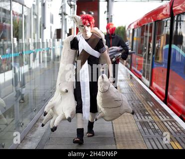 Les cojoueurs arrivent au MCM London Comic con à Londres Excel le dimanche 25 octobre. Banque D'Images