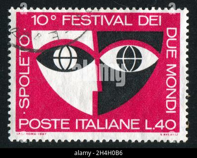 ITALIE - VERS 1967: Timbre imprimé par l'Italie, montre masque stylisé, vers 1967 Banque D'Images