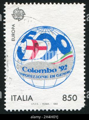 ITALIE - VERS 1992: Timbre imprimé par l'Italie, montre Globe et exposition amblem, vers 1992 Banque D'Images