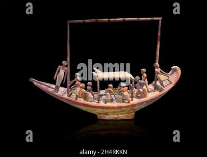 Modèle de bateau en bois égyptien, vers 2000 av. J.-C., Empire moyen.Musée du Louvre inv E17111.Sous la voûte, une momie placée sur le lit.Comme pour les autres mois Banque D'Images