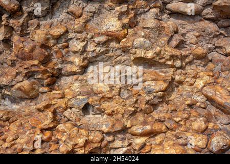 Texture de fond de surface rocheuse semblable au béton.Image horizontale. Banque D'Images