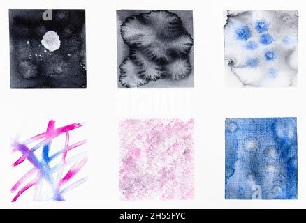 échantillons de diverses techniques de peinture à l'aquarelle dessinées à la main sur papier blanc texturé Banque D'Images