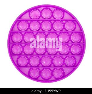 Rond violet simple fossle, le pop.Jouet antistress tendance et moderne pour les enfants et les adultes Banque D'Images