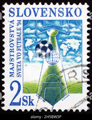 SLOVAQUIE - VERS 1994: Timbre imprimé en Slovaquie dédié aux Championnats du monde de football 1994, États-Unis, vers 1994 Banque D'Images