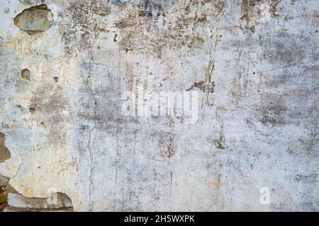 Texture ou arrière-plan du mur en béton fissuré. Gros plan Banque D'Images