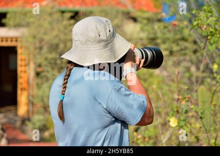 Photographe, Centre d'interprétation des visiteurs du parc national des îles Galapagos, Puerto Baquerizo Moreno, île de San Cristobal, Équateur Banque D'Images