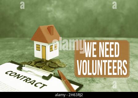 Légende de texte présentant nous avons besoin de bénévoles.Photo conceptuelle quelqu'un qui travaille sans être payé pour lui présenter la marque Nouvelle maison, la vente à domicile Banque D'Images