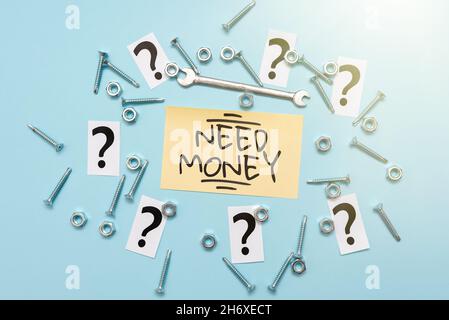 Affiche indiquant le besoin d'argent.Photo conceptuelle besoin d'une aide financière pour soutenir les dépenses ou s'efforcer Outils d'entretien et équipements mécaniques Banque D'Images