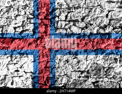 Drapeau des îles Féroé représenté sur un mur en pierre.La texture de la pierre se fond parfaitement avec les couleurs de la bannière Banque D'Images