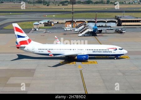 Comair Afrique du Sud Boeing 737 à l'aéroport de Johannesburg.Comair est un franchisé sud-africain de British Airways qui exploite des vols intérieurs. Banque D'Images