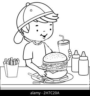 Garçon mangeant un hamburger dans un restaurant.Page de couleur noir et blanc Banque D'Images