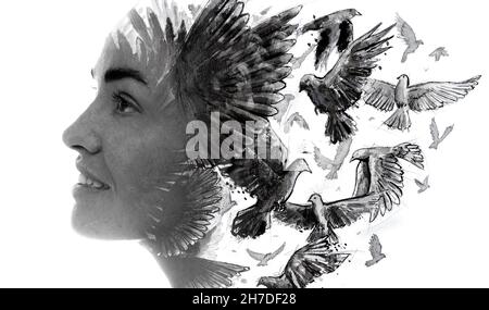 Peinture.Portrait d'une femme combiné à une peinture à l'encre d'oiseaux volants. Banque D'Images