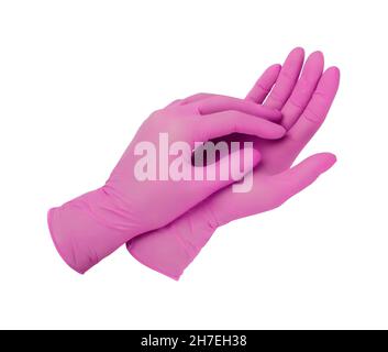 Gants médicaux.Deux gants chirurgicaux roses isolés sur fond blanc avec les mains.Fabrication de gants en caoutchouc, la main humaine porte un gant en latex Banque D'Images