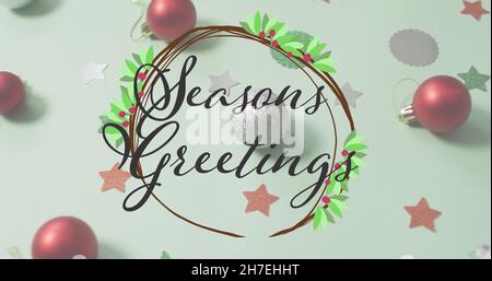 Image du texte de voeux de saisons sur les décorations de noël Banque D'Images